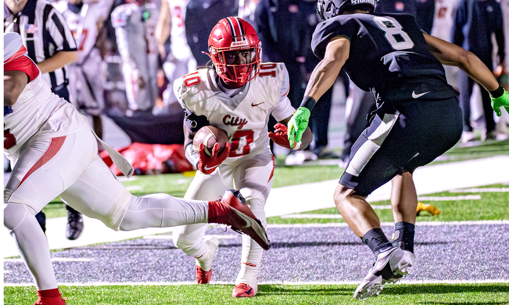 Daytuawn Pearson ran for 3 TDs in the first half of the Rams' win at Laney. (Photo by Eric Sun)