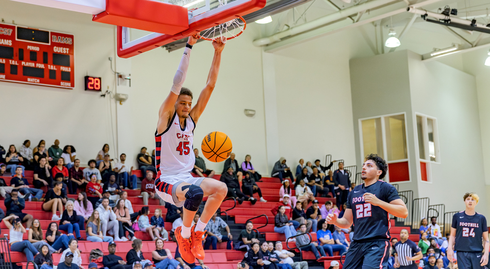 Kenyon DeMuynck dunks for two points in the Rams' playoff win over Foothill. (Photo by Eric Sun)